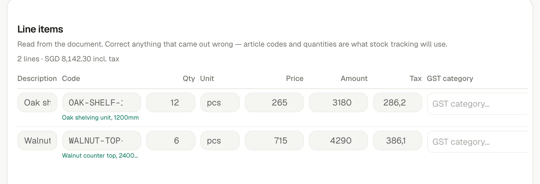 The line items invoiso read off a supplier bill, with codes, quantities and tax.